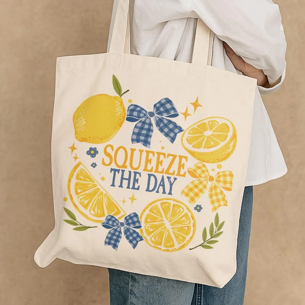 Illustrated canvas wedding welcome tote bag with lemon motif for destination wedding guests